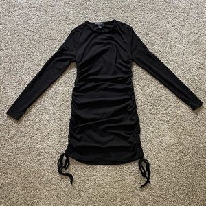 Black bodycon dress with side ruching!